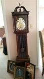 Grandfather's clock with framed pictures