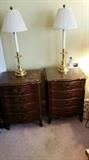 Cherry nightstands with drawers. Brass lamps.