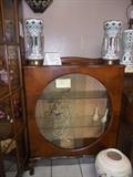 Round glass front curio cabinet Luster lamps