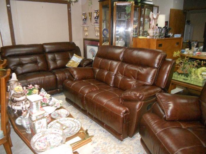 Leather sofa, loveseat and chair all reclining