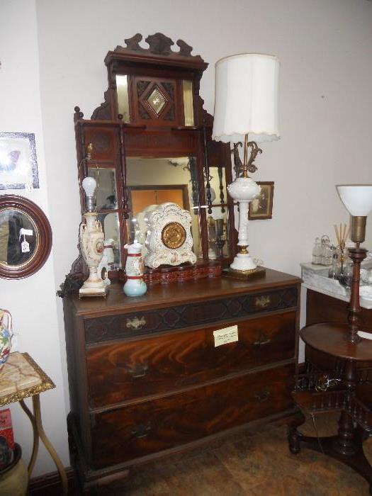 Porcelain clock, lamps, dresser, ornate mirror separate