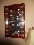 Asian motif curio cabinet