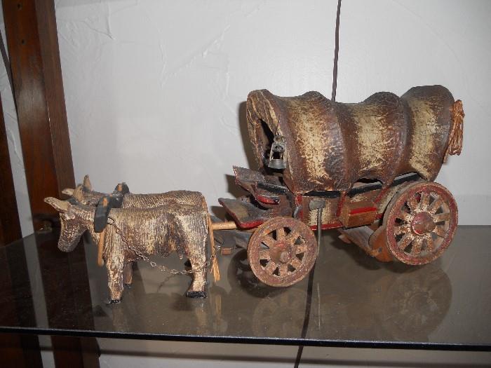 Early 1900's hand crafted Conestoga Wagon drawn by Oxen.  Small tools attached - no damage - excellent condition