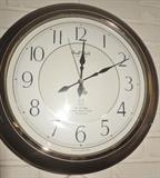 Small World Rhythm clock.  Musicians dance and play music on the hour