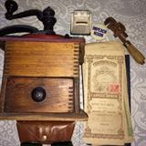 Antique coffee grinder, tool and stock certificates, Ray Ban glasses and case