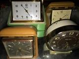 Vintage alarm clocks including Elgin and Big Ben