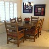 Stone Creek custom dining room table with 6 chairs and 2 leaves. 