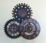Metal interlocking clocks. Maybe about 30"x20"?
