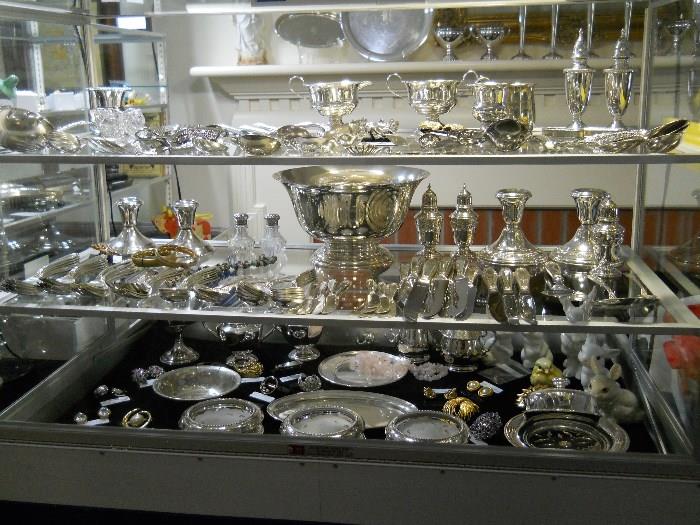 showcase filled with sterling and jewelry