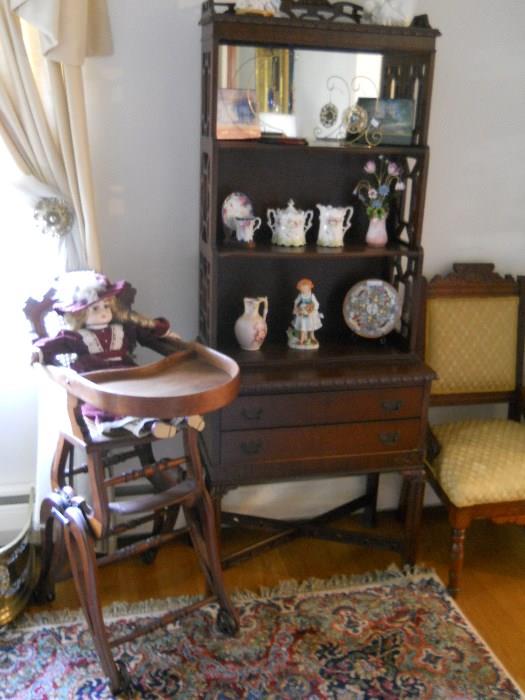 Eastlake side chair, mahogany what not cabinet with drawers, vintage convertible high chair with cane back and seat, etc.
