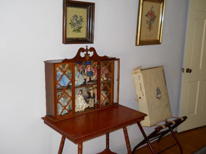 vintage table, Madame Alexander dolls, luggage rack, etc.