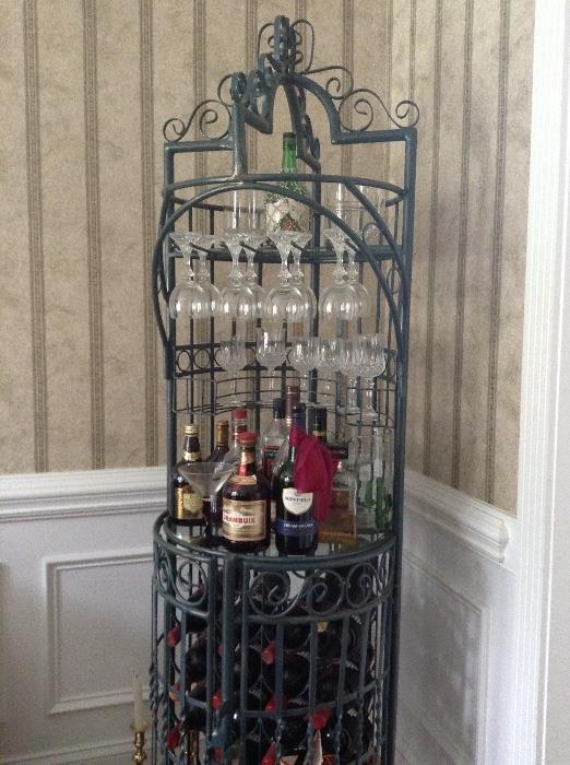 There is a pair of 6 ft. tall metal wine racks