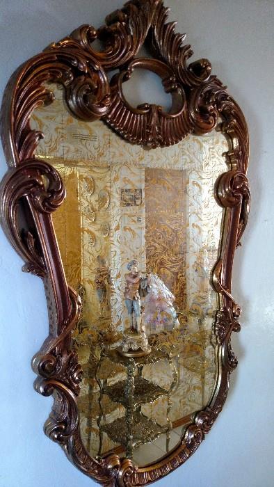 Ornate gilt guesso Italian Baroque mirror 