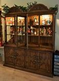 China cabinet with Duncan Royale statues