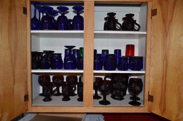 Cabinets are full of quality kitchenware! 