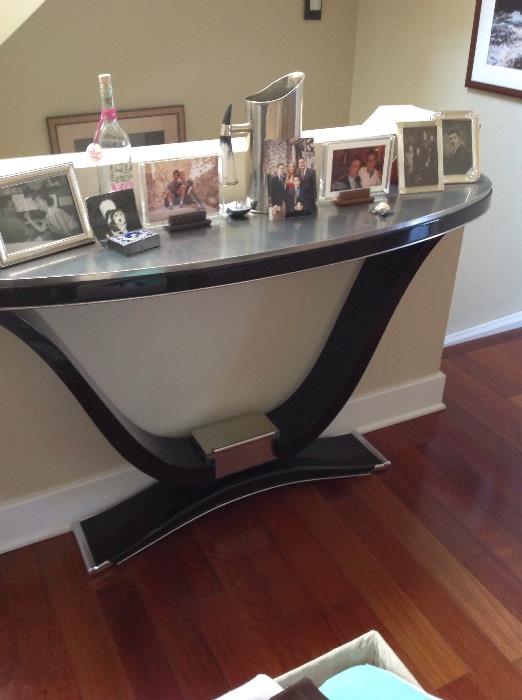Theodore Alexander silver gilt and ebonized console table