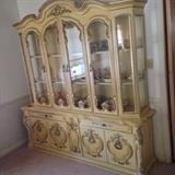 Solid wood midcentury china cabinet. Lights up too. 