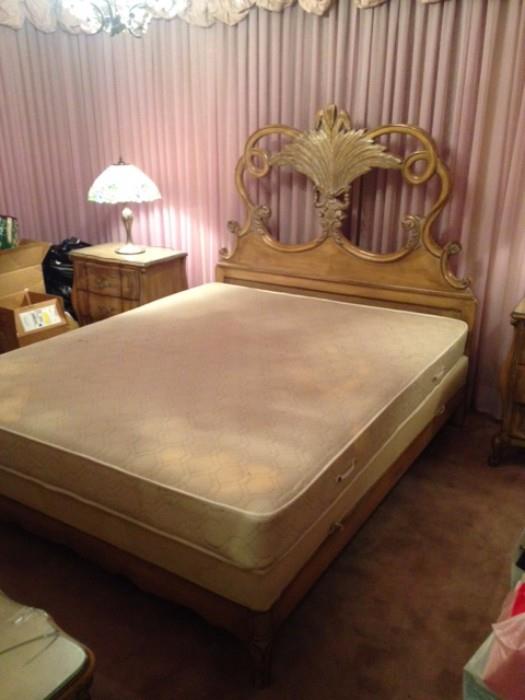 Custom made bed frame is one of a kind - measures 62 x 75. Solid carved wood. 
