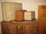 Vintage suitcase and train case