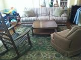 Tweed sofa with solid oak trim and frame (there is a matching love seat upstairs), rocking chair, square oak coffee table, and nice channel back club chair, and children's riding toys. 