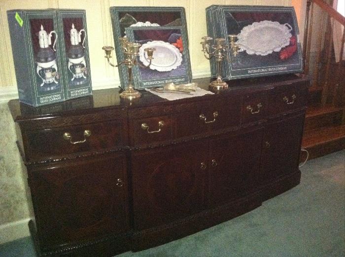 Beautiful sideboard table, buffet. The perfect piece to compliment a stately dining room table. New silver plate silver platters and trays. 