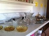 Glassware, silver plate, crystal, and serving pieces. 