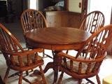 Solid oak claw foot table & four chairs