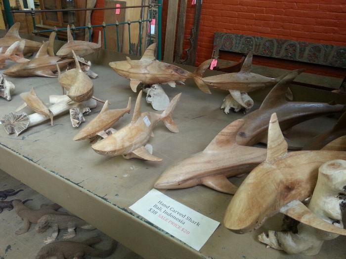 carved wood sharks