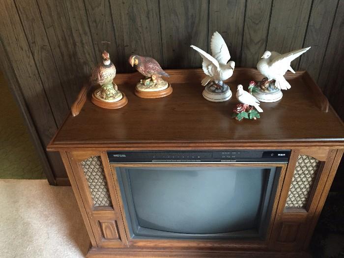 Vintage console TV with Decorative birds sitting on top