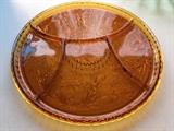 This I believe is a divided amber plate, possibly depression glass.