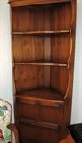 Corner Hutch   with  rich oak colored finish, open shelves and double door cabinet  storage