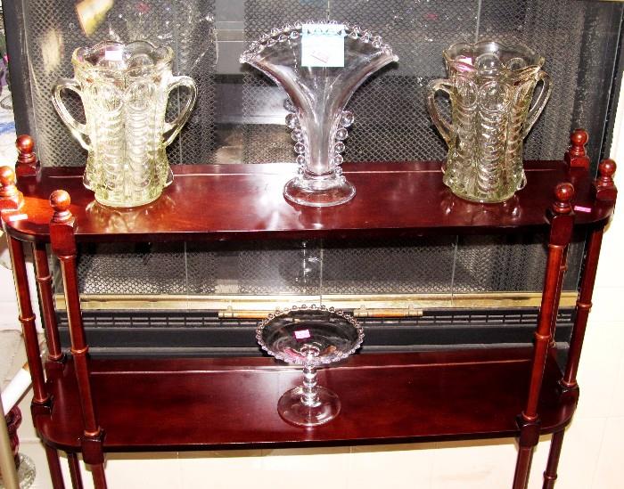 Excellent Vintage Mahogany Knick Knack Shelf with nicely spindled legs, and three open display style shelves; Also shown are some of the Collection of Vintage glasswares available in this sale...Vintage Candlewick glasswares...vase and footed dish, Vintage Pressed Glass items...2 double handled Vases;