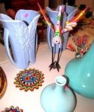 Some of the excellent collection of Vintage  Pottery...two handled vases / urns,  available in this sale.  (items shown are unmarked but believed to be McCoy or Haeger vintage pottery).  Also shown are some Mexican Folklore or whimsical items, and  colorful & nicely beaded  accent artworks