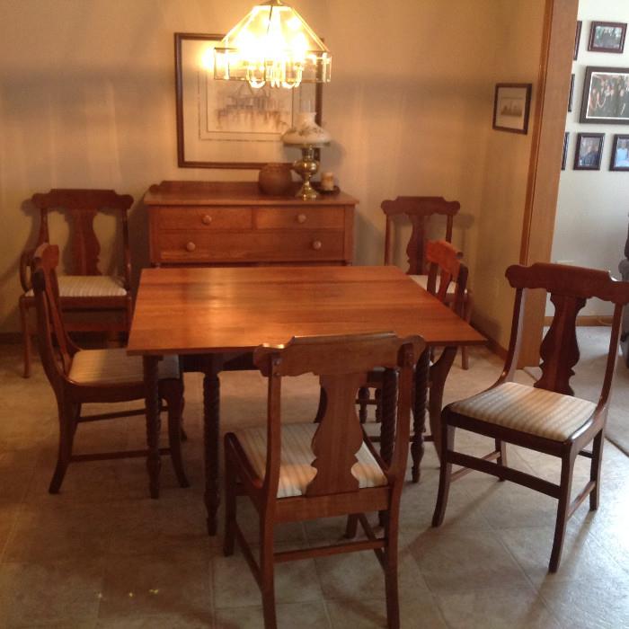Willett cherry gate leg table with six chairs, including captain chair and full table pads