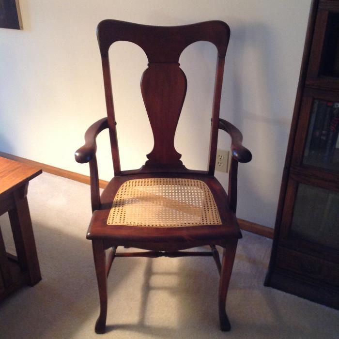 antique armchair with cane seat