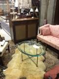 French Regency style sideboard, shearling rug, brass and glass cocktail table, chippendale sofa, wool carpet etc.