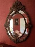 Large round composite gilt mirror