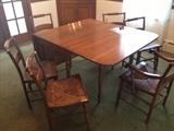 Cherry drop leaf table and 6 rush seat chairs