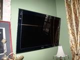 Samsung large flatscreen tv - Comes with remote, wall mount and all cords, etc.