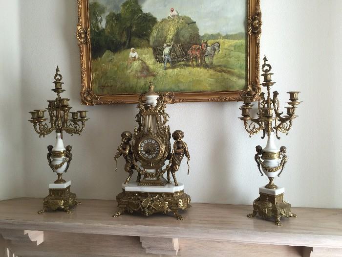 Imperial bronze mantle clock and candelabras by Brevettato