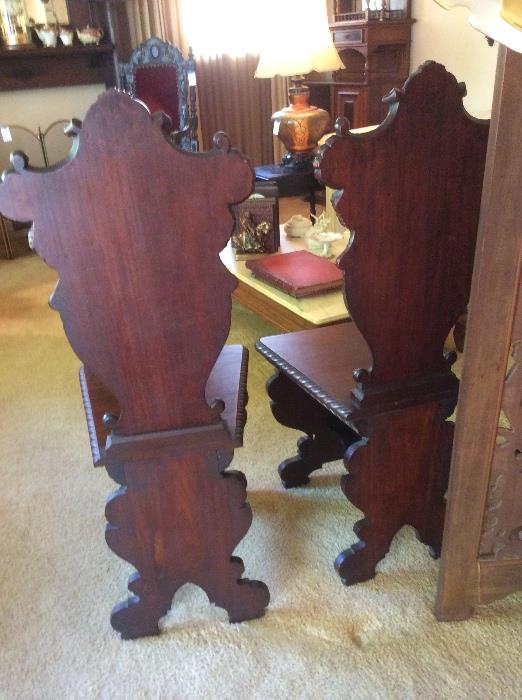 Back of carved chairs