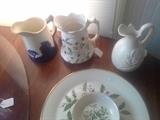 Old Sleepy Eye quart pitcher on left, Lenox "Holiday" pattern in foreground. Others sold.
