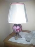 Another beautiful lamp. The glass is hand-painted and certainly antique. The brass base may be newer, but is still quite old.