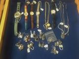 Women's watches almost all work. Pocket watches will need some TLC. The earrngs and pendants in this photo are sterling or 14K. (Some earrings and two watches have sold.)