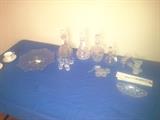 Some of the fine crystal here. Two decanters, the cruet, the set of six tall aperitif glasses, the large tray and two bird figurines remain.