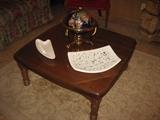 solid wood coffee table and modern ashtrays