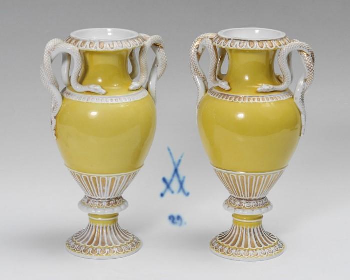 Lot 1016:  PR MEISSEN PORCELAIN YELLOW GROUND SNAKE HANDLE VASES: Each with entwined double snake handles, gilt trim throughout. Crossed swords marks, 11''h.