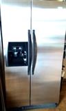 Whirlpool side by side chrome frig w/ outside of door ice & water dispencer