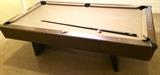 7' slate pool table sold with wall pool cue rack and sticks. 