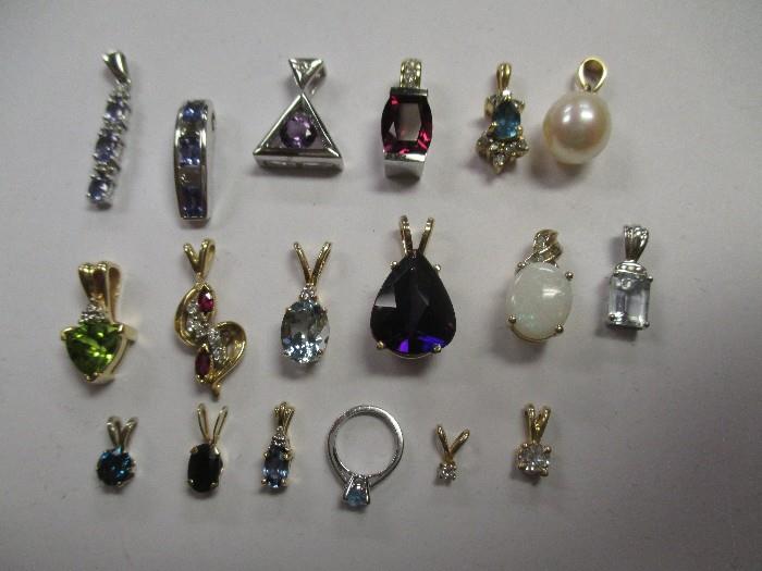 And even more gold pendants with assorted gemstones